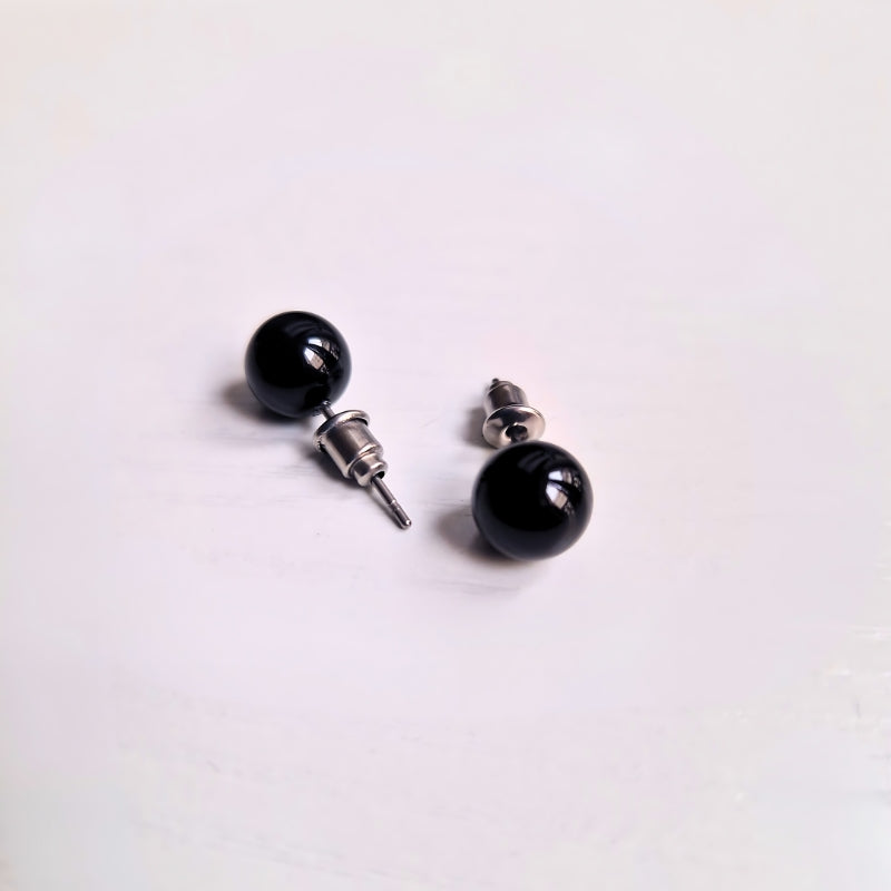 Puces d’oreilles | Agate noire : Protection et stabilité