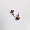 Puces d’oreilles | Œil du Tigre : Protection et confiance - Zelia Paris